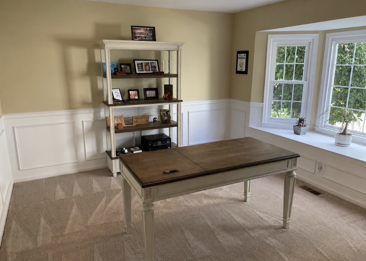 Completed home office renovation with custom wall paneling